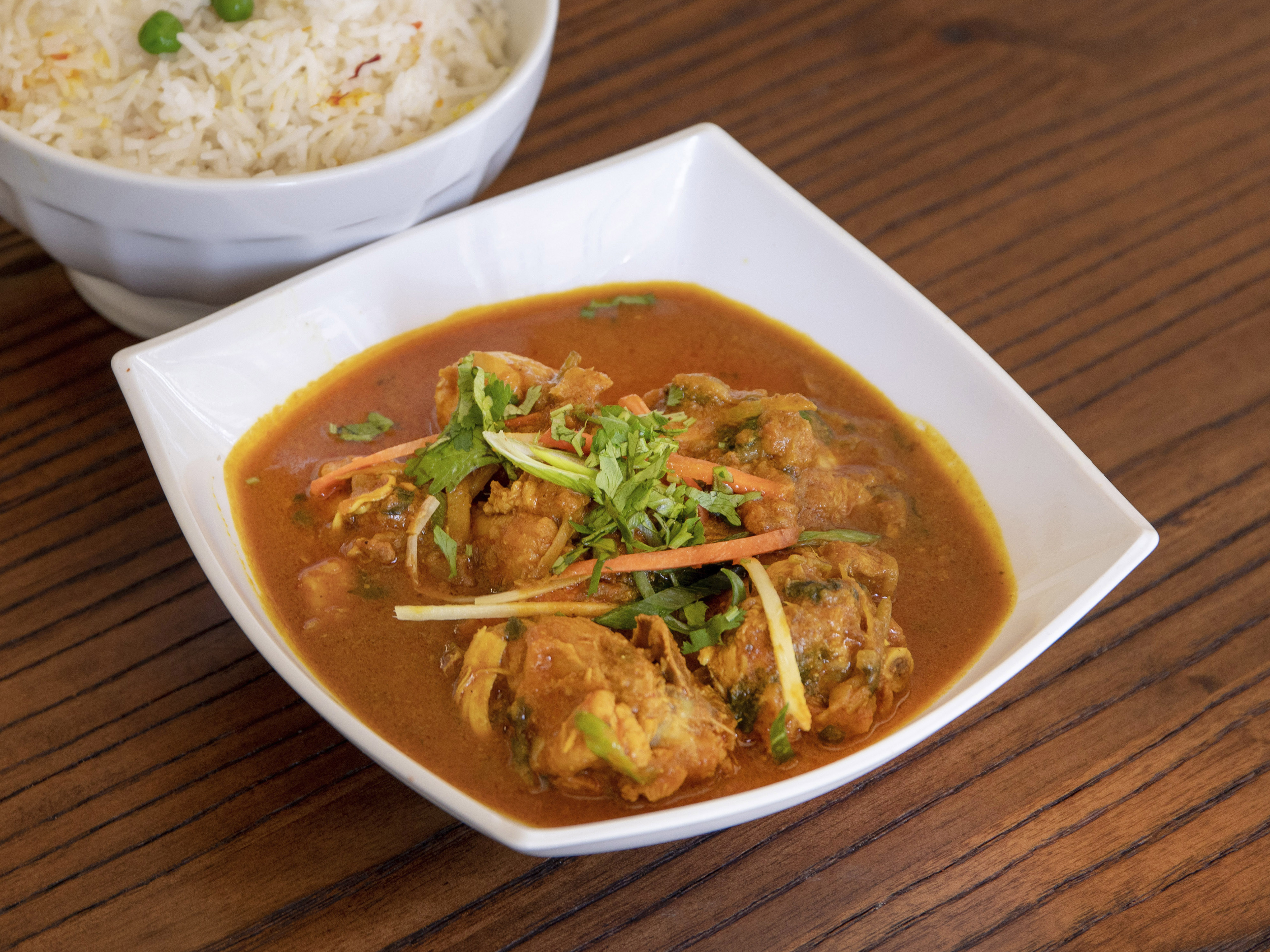 Order Himali Chicken Curry food online from Himalayan Pizza & Momo store, San Francisco on bringmethat.com