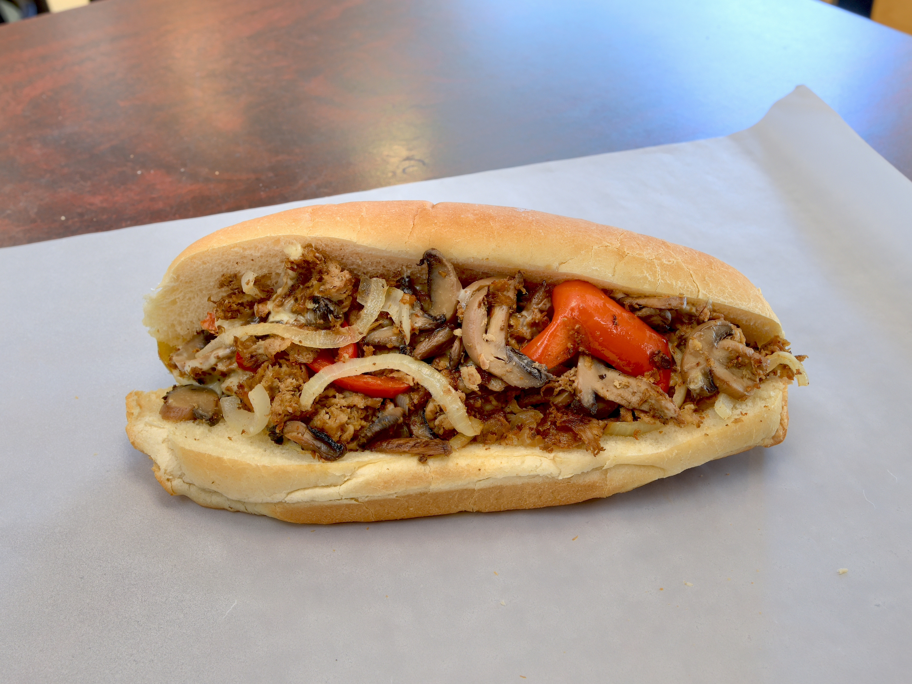 Order Steak and Cheese Sub food online from Homestead Grocery & Deli store, Amherst on bringmethat.com