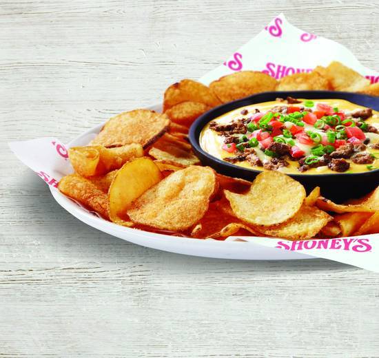 Order Queso with Spicy Beef & Chips food online from Shoney store, Lawrenceville on bringmethat.com