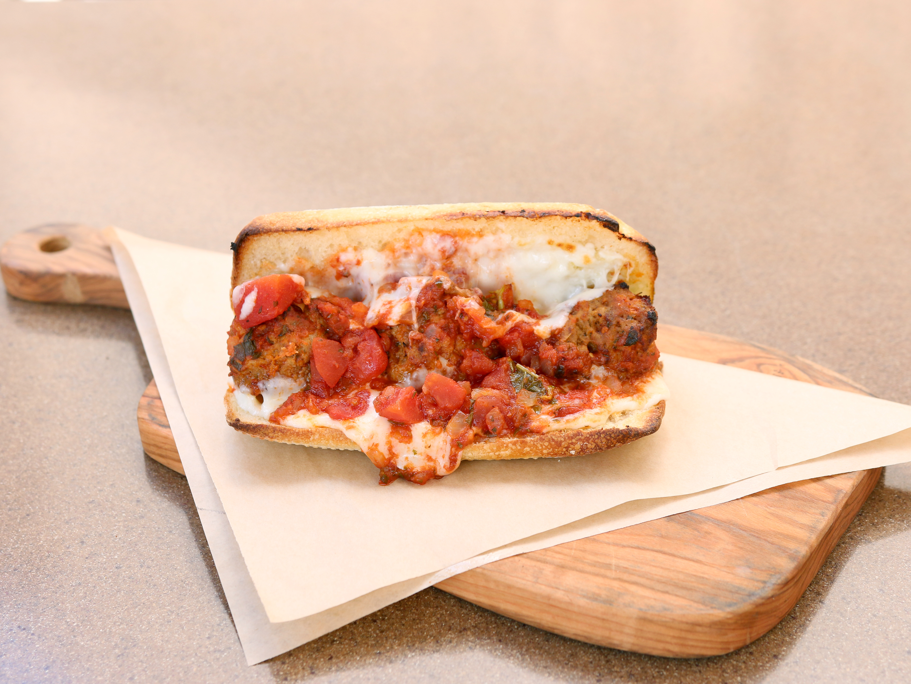 Order Baked Homemade Meatball Sub food online from Tower 15 Pizzeria store, Huntington Beach on bringmethat.com