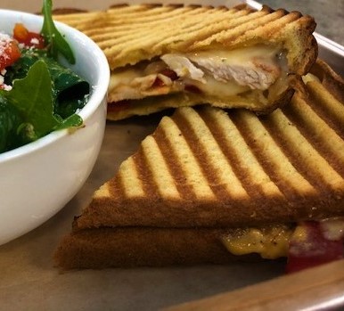 Order Southwest Chicken Panini - served hot food online from Our Happy Place Cafe store, Corona on bringmethat.com
