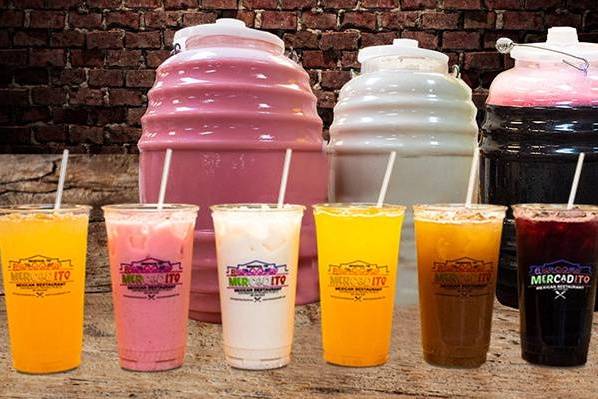 Order Large Fruit Water (32 oz) food online from El Mercadito Mexican Restaurant store, Memphis on bringmethat.com