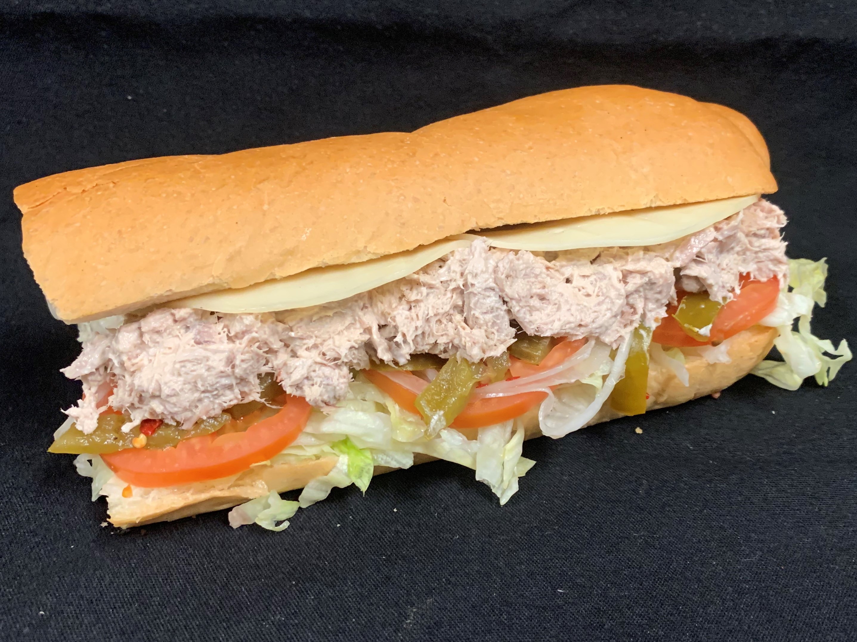 Order 13. Tuna and Cheese Sub food online from Tony Subs & Pizza store, Inglewood on bringmethat.com