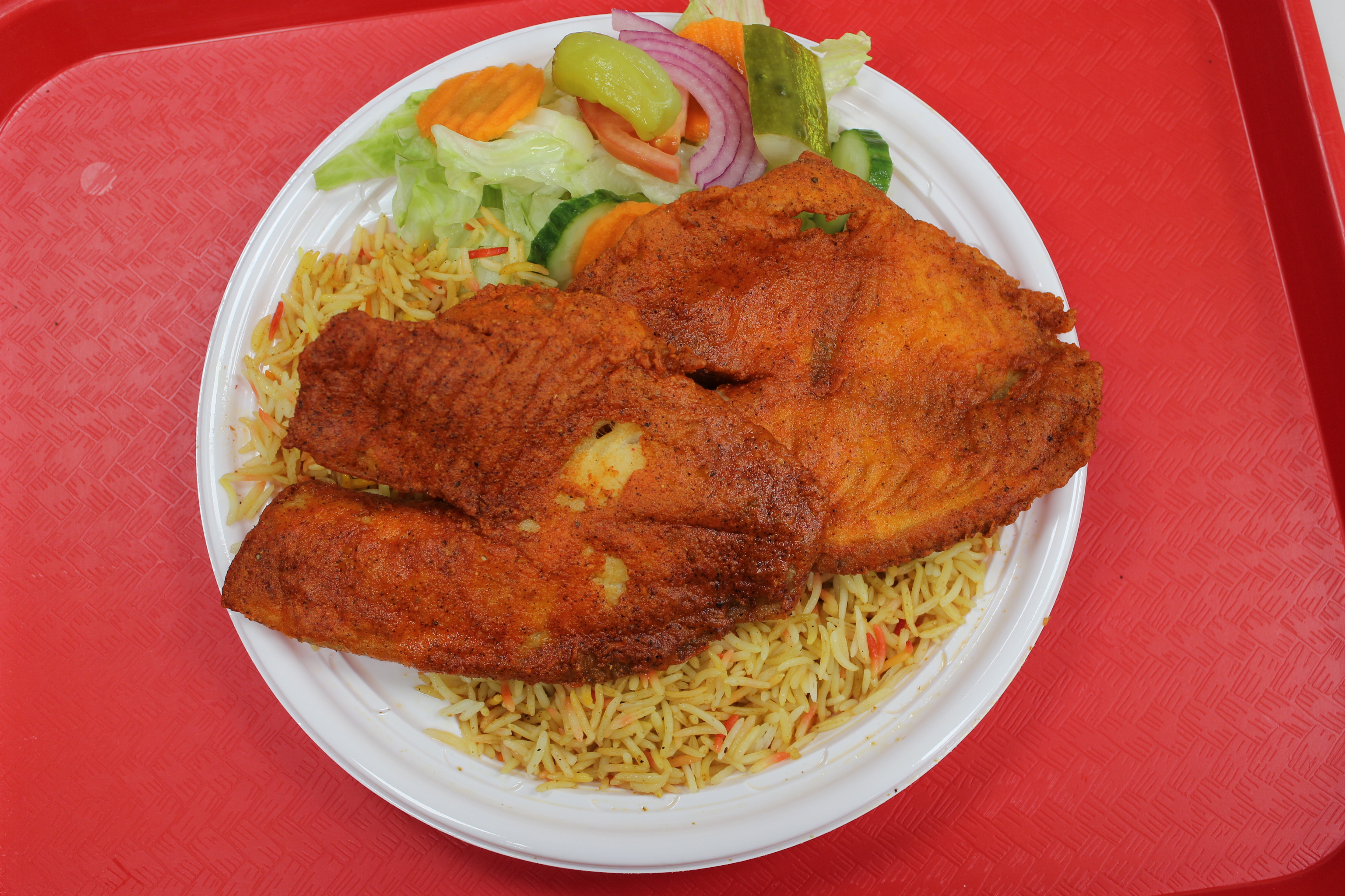 Order 10. Tilapia Fish Lunch Plater food online from Peshawri Kebab store, Waltham on bringmethat.com