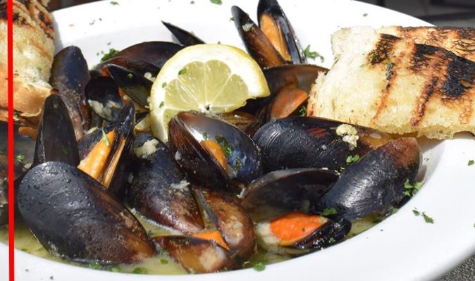 Order Roasted Garlic Mussels food online from Phoenix Fire Grill & Bar store, Canfield on bringmethat.com