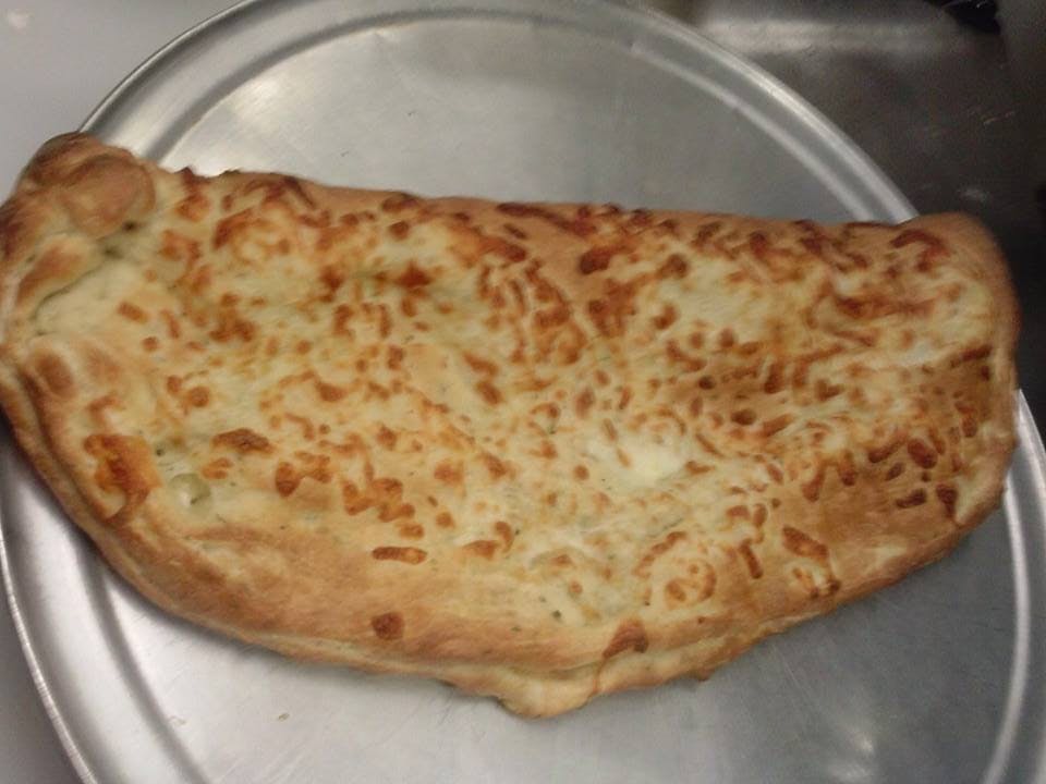 Order Colossal Calzone - Calzone food online from Gennaro Cafe Italiano store, Denver on bringmethat.com
