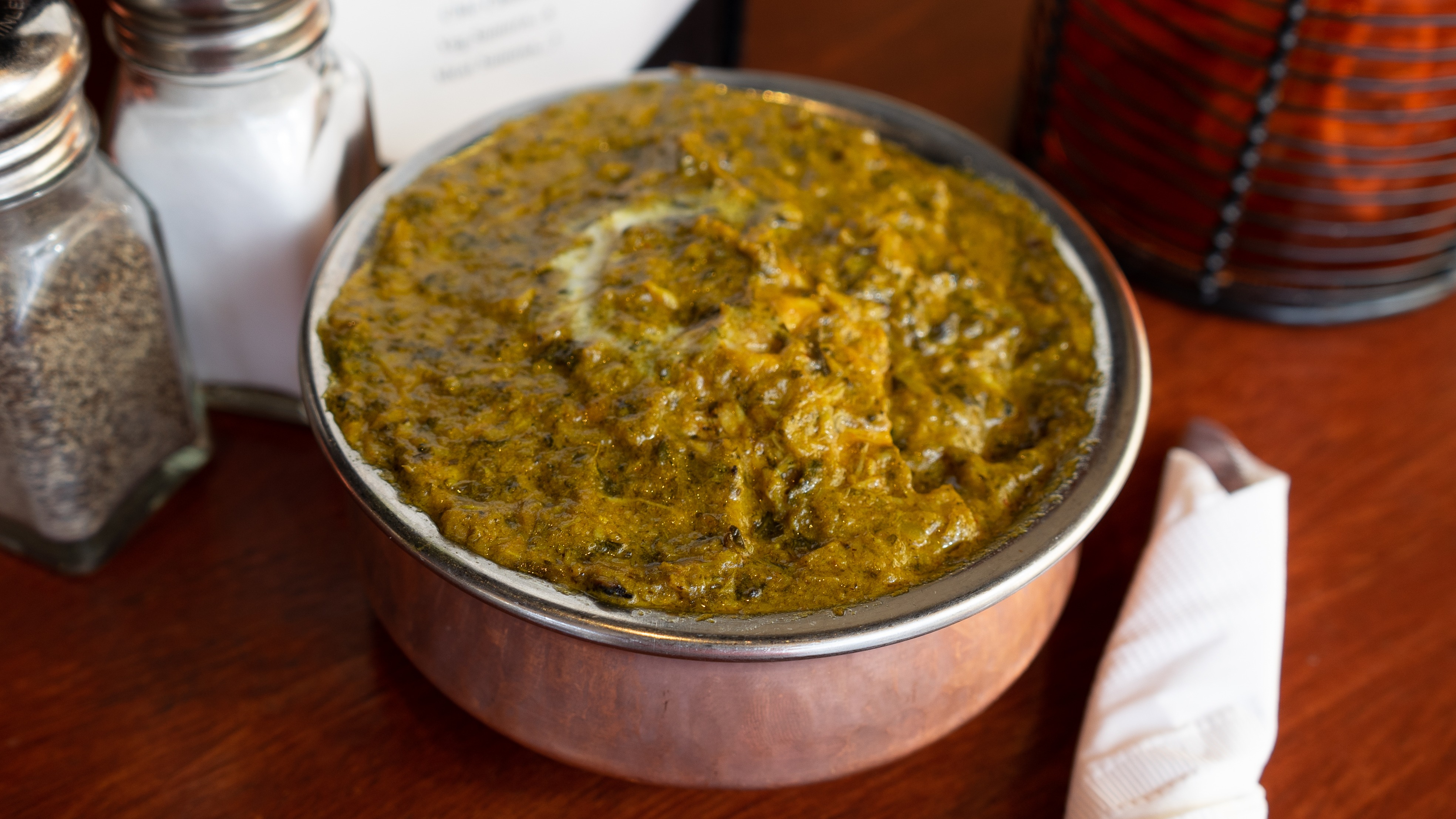 Order Chicken Saag food online from Little India Restaurant store, Lakewood on bringmethat.com
