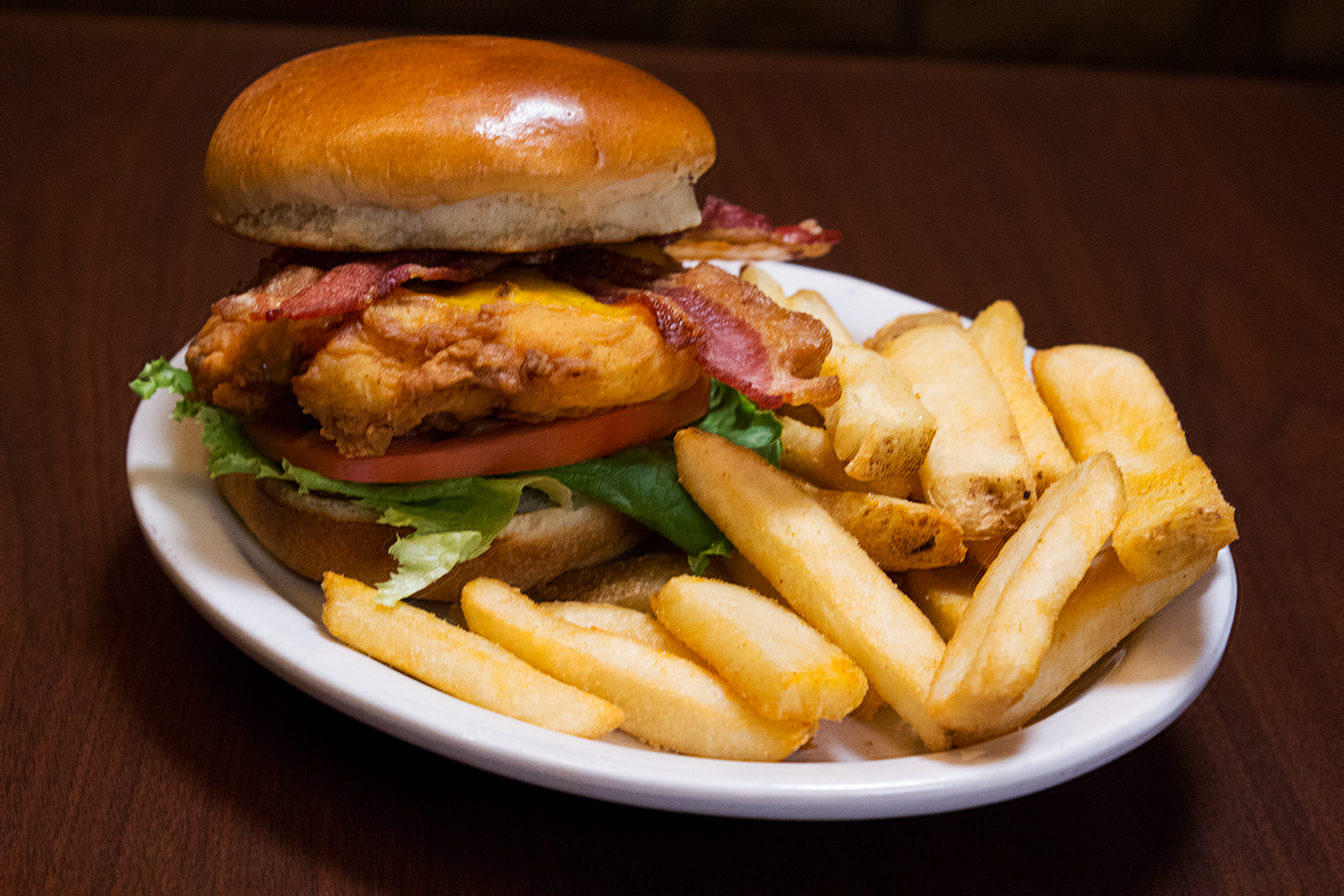 Order Chicken Club Sandwich food online from Texas Corral store, Merrillville on bringmethat.com