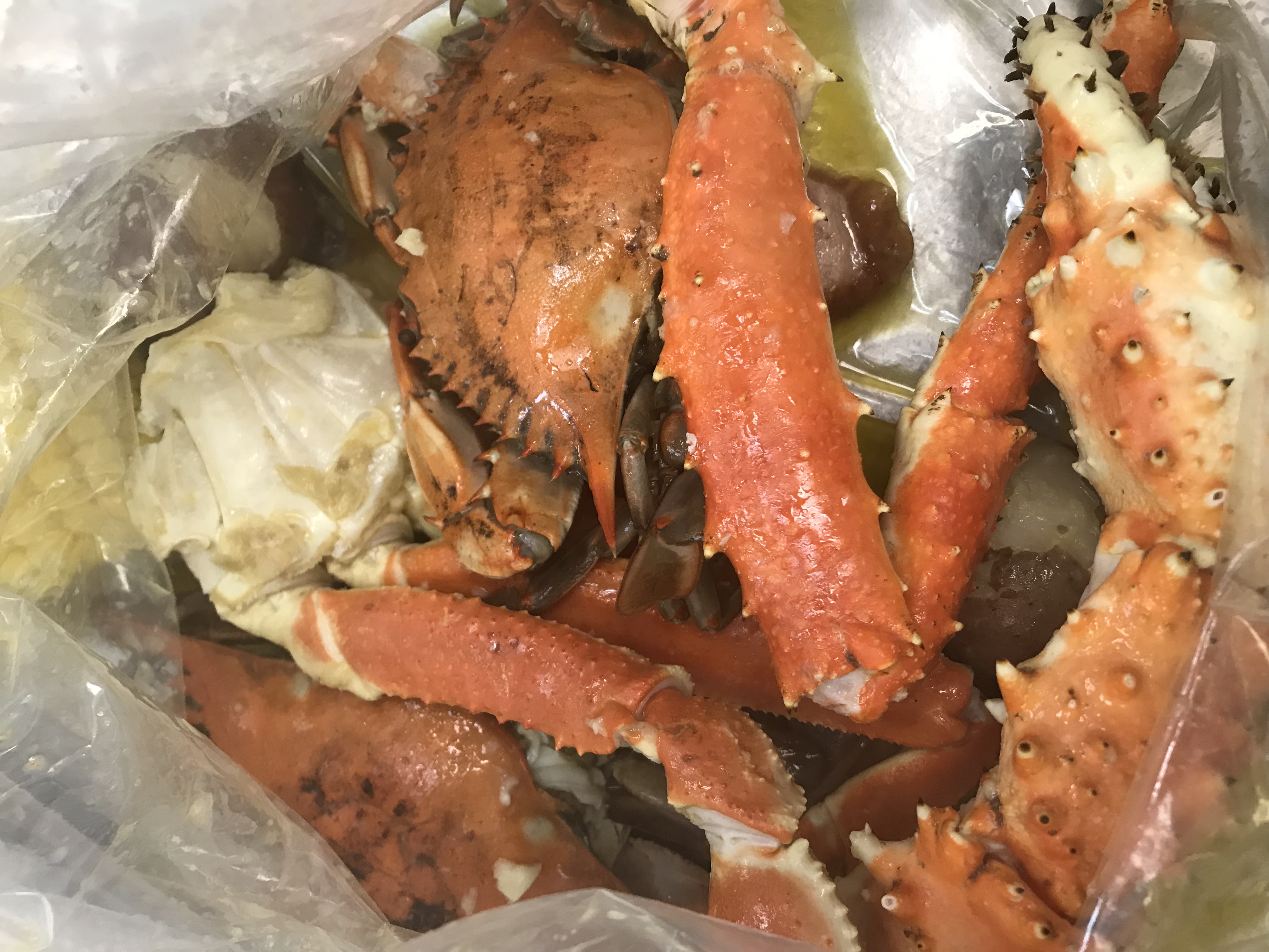 Order J. 1/2 lb. Snow Crab, 1/2 lb. King Crab and 1/2 lb. Blue Card Combo food online from Tasty Crab store, Fayetteville on bringmethat.com