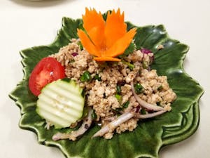 Order 19. Larb (Traditional Spicy Chicken Salad) food online from Siam Elephants Restaurant store, Elmira on bringmethat.com