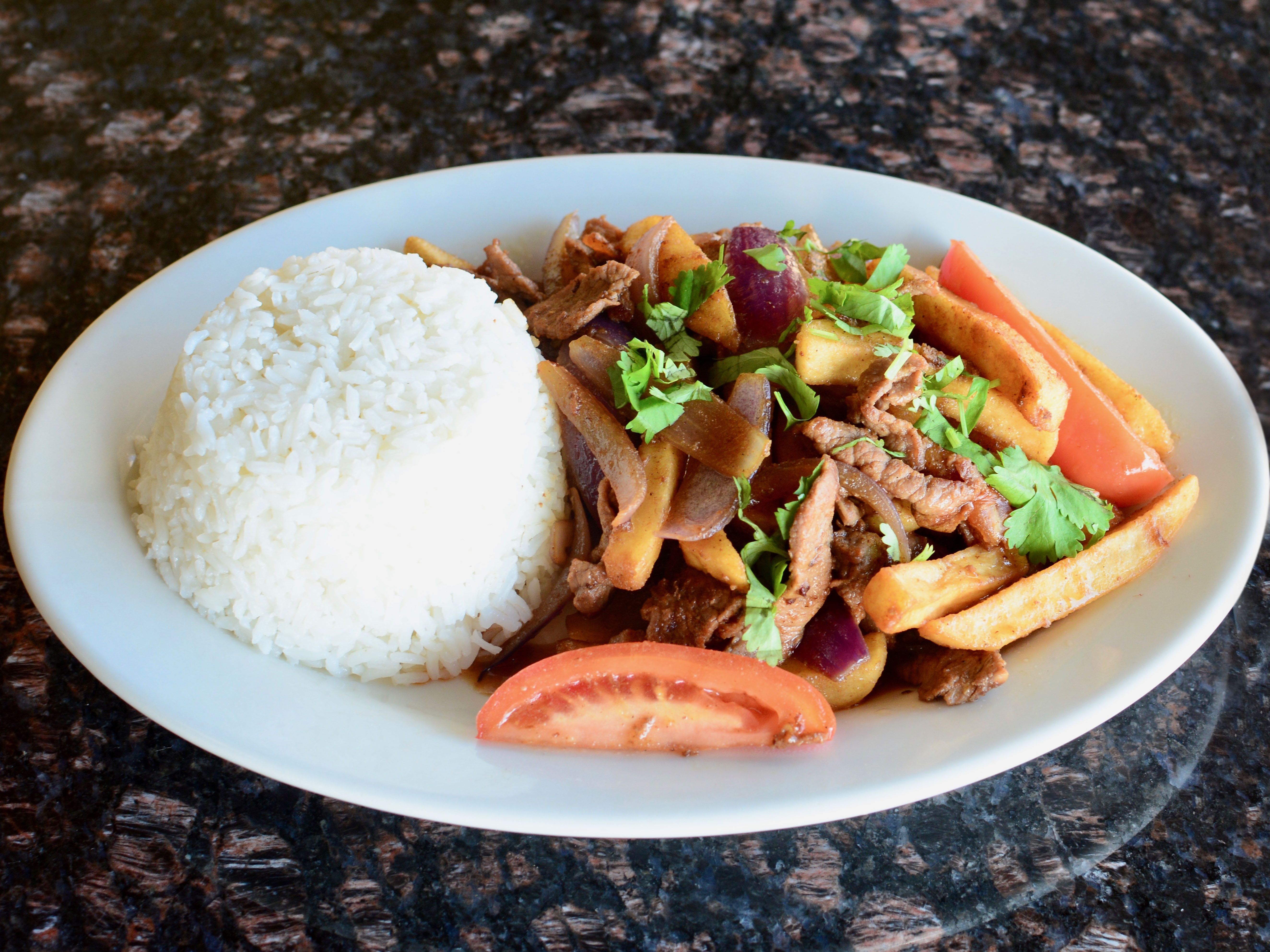 Order Lomo Saltado food online from Pizza Palace store, Sterling on bringmethat.com