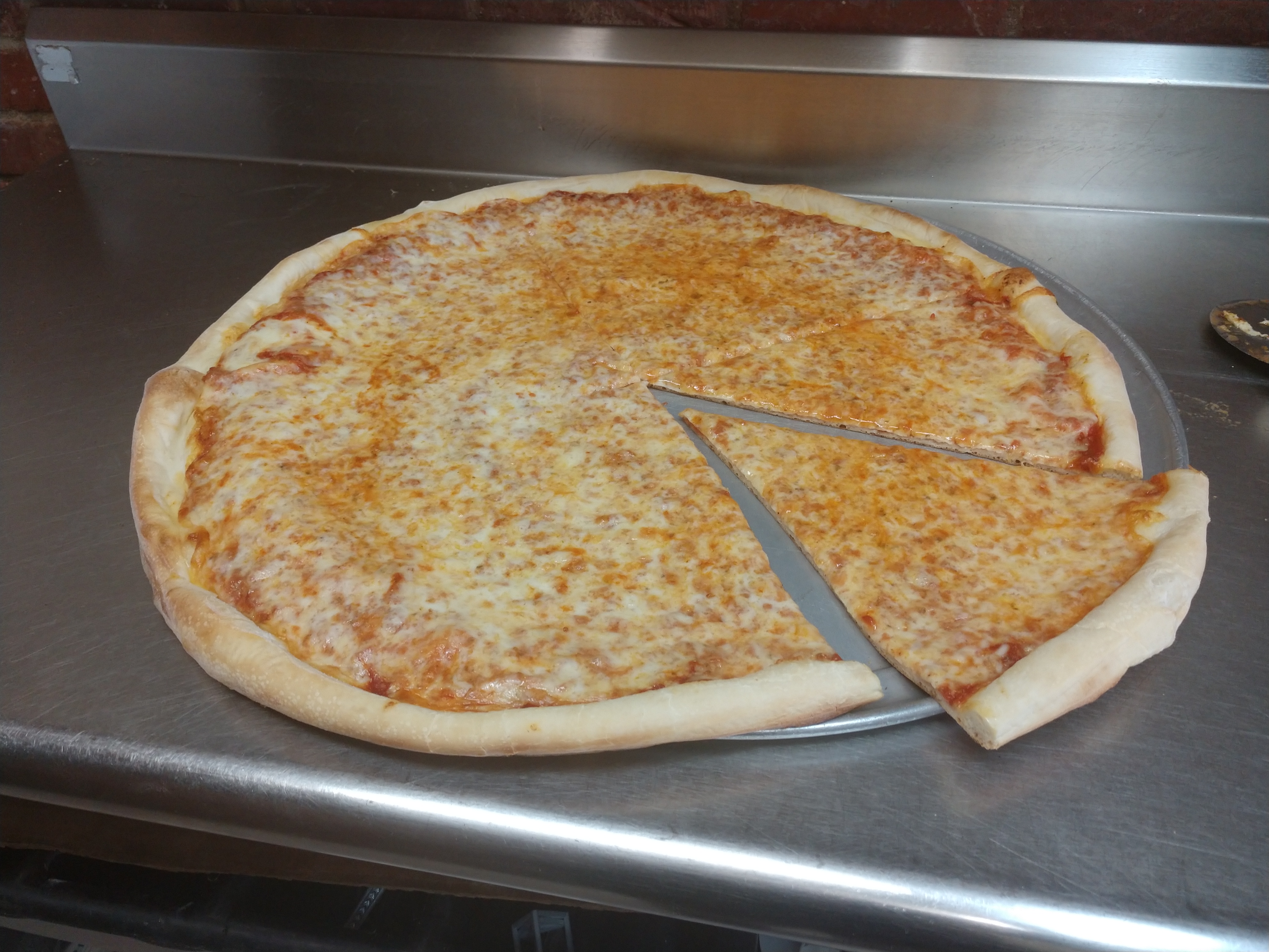 Order Plain Cheese Pizza food online from Pizzarelli's Pizza store, Scarsdale on bringmethat.com