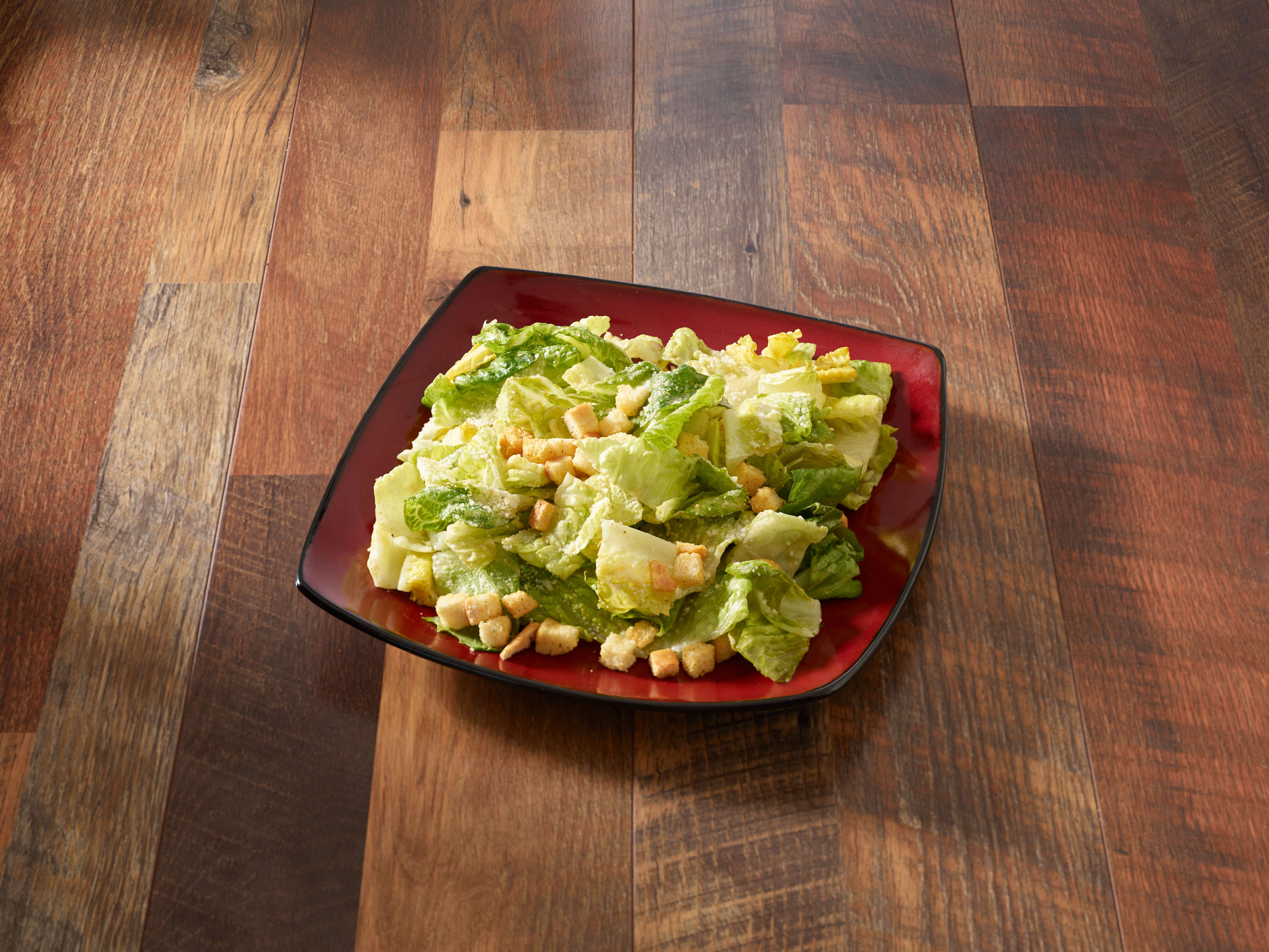 Order Caesar Salad food online from Gippers Restaurant and Ale House store, Milford on bringmethat.com