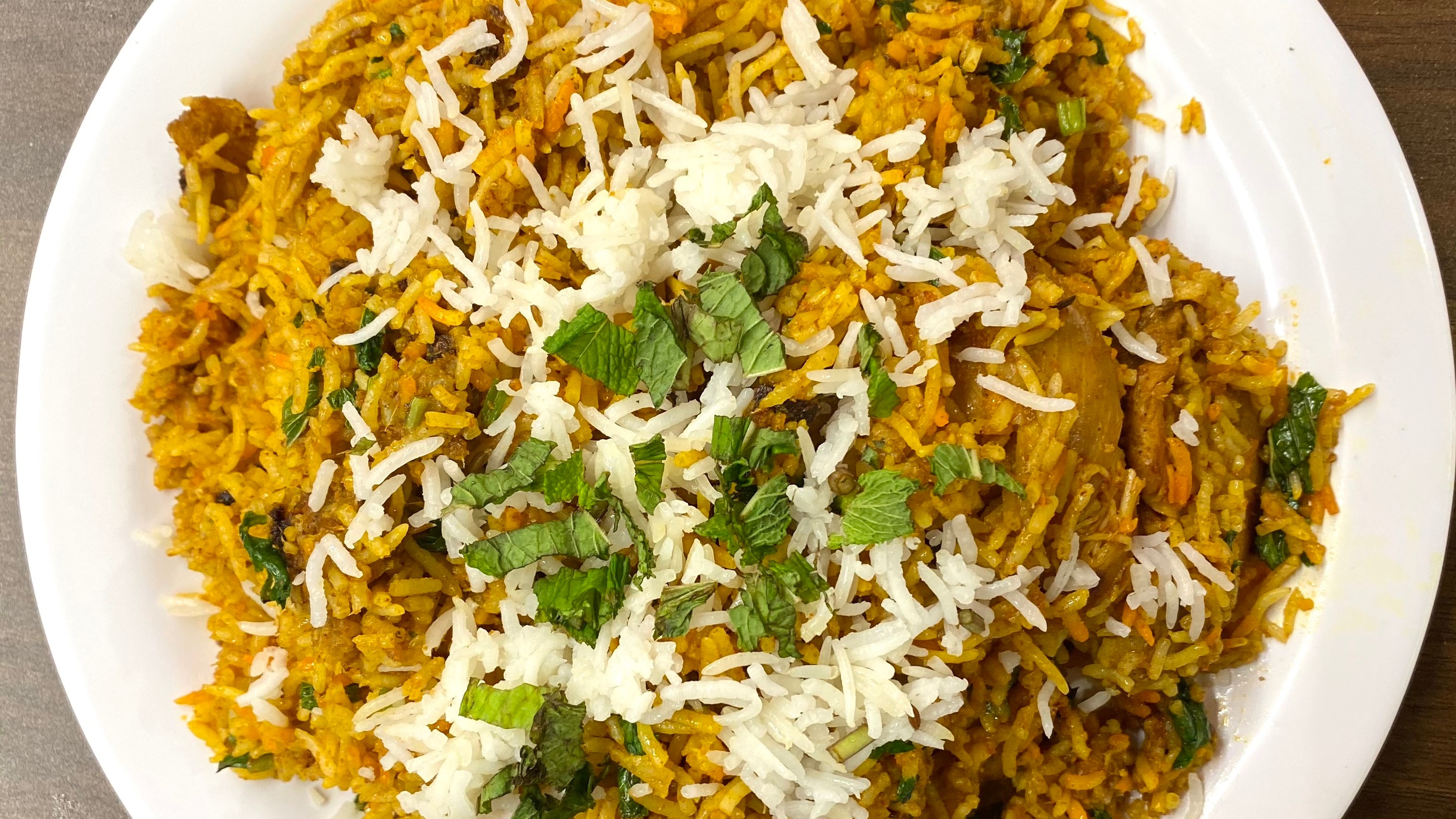 Order Chicken Biryani food online from Indian Cafe store, East Moline on bringmethat.com