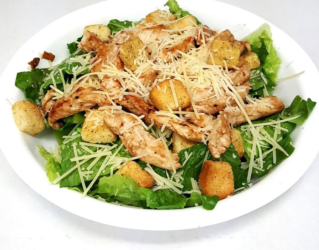 Order Caesar Salad food online from Nostra Pizza store, Greensboro on bringmethat.com