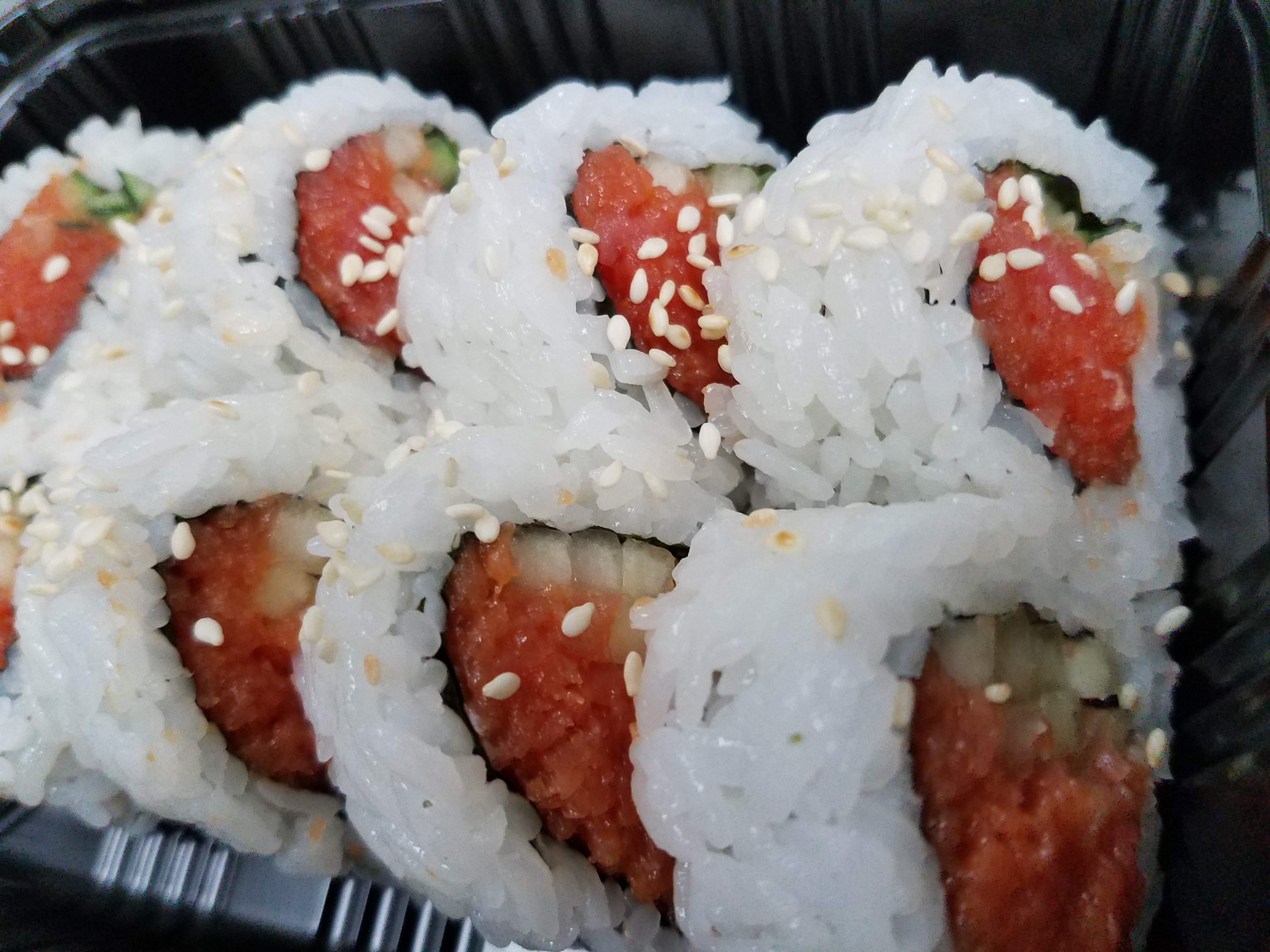 Order 8 Piece Spicy Tuna Roll food online from Orange House Take Out store, La Habra on bringmethat.com