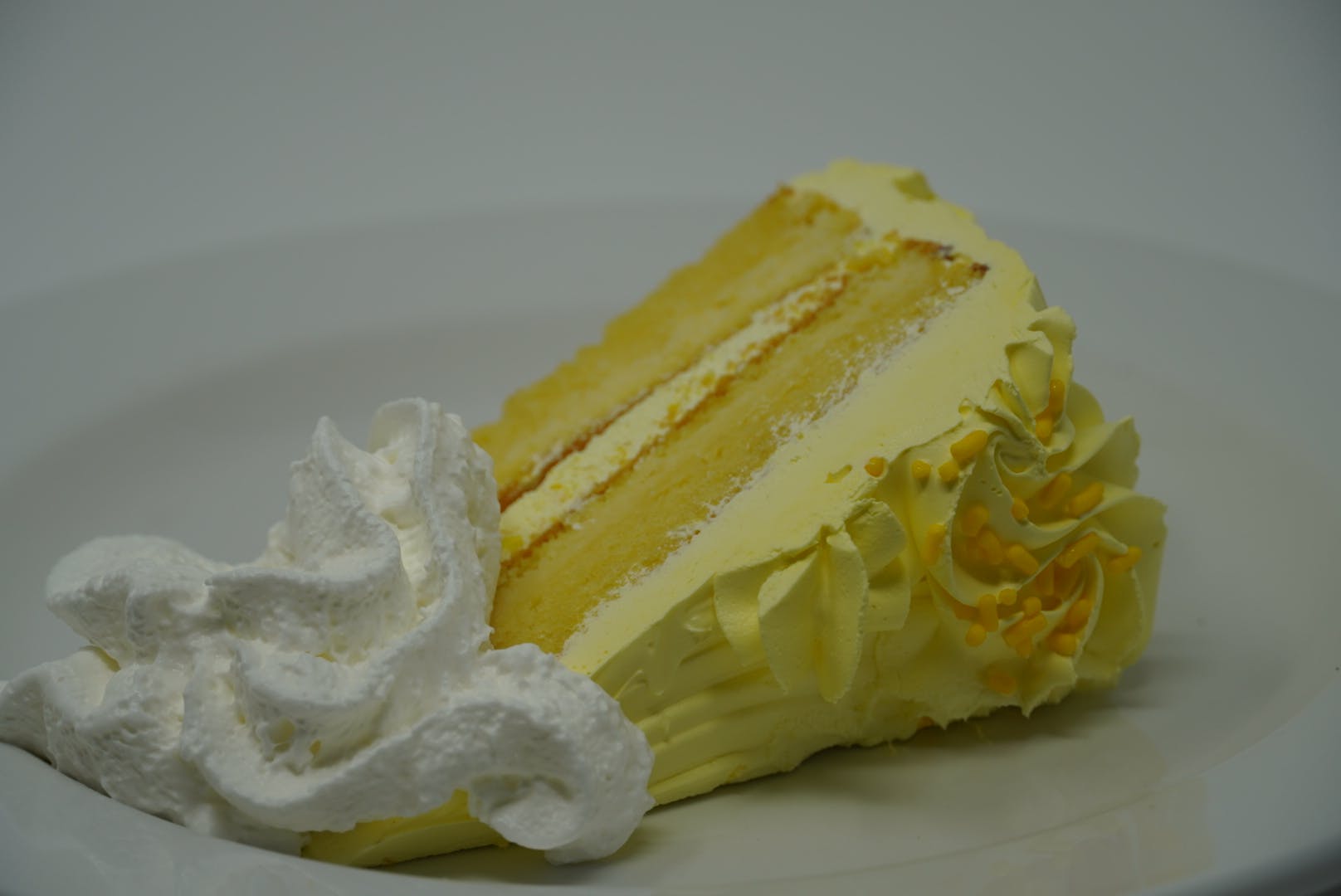 Order Lemon Cake - Dessert food online from DeNunzio's Italian Restaurant - Latrobe store, Latrobe on bringmethat.com