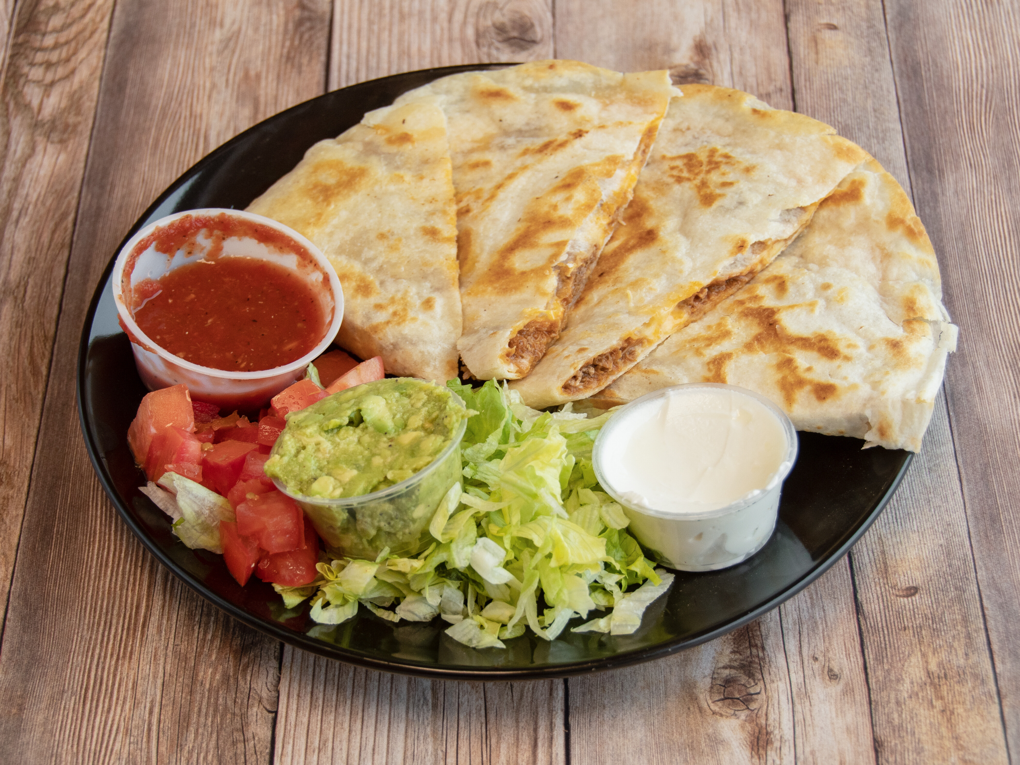 Order Quesadilla food online from Trini Mexican Carry Out store, New Baltimore on bringmethat.com