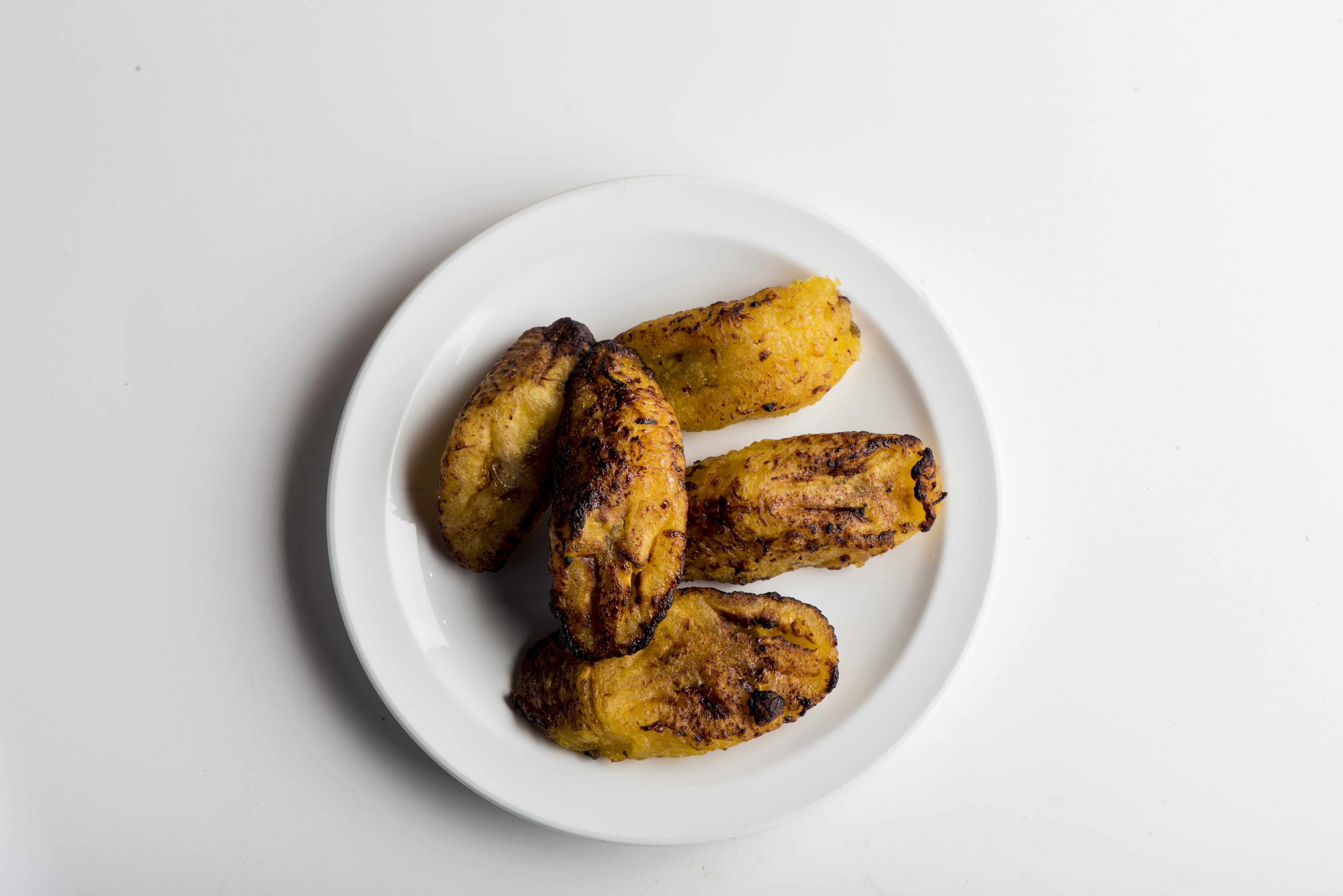 Order ESO Side Roasted Sweet Plantains food online from Bliss Bowl store, New York on bringmethat.com