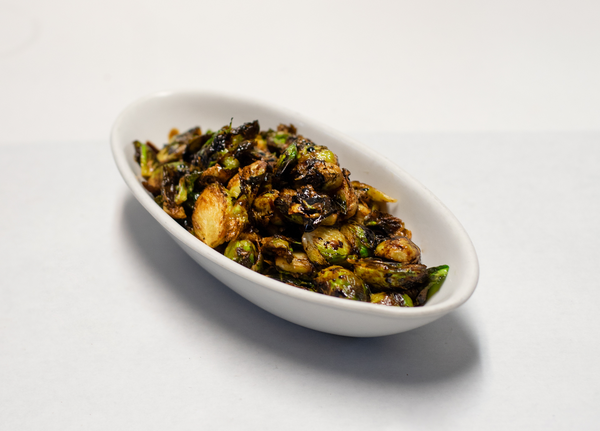Order Roasted Brussels Sprouts food online from Five Points Pastrami store, New York on bringmethat.com
