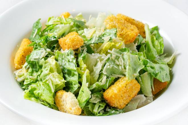 Order SIDE CAESAR SALAD food online from Johnny Carino's store, Sioux Falls on bringmethat.com
