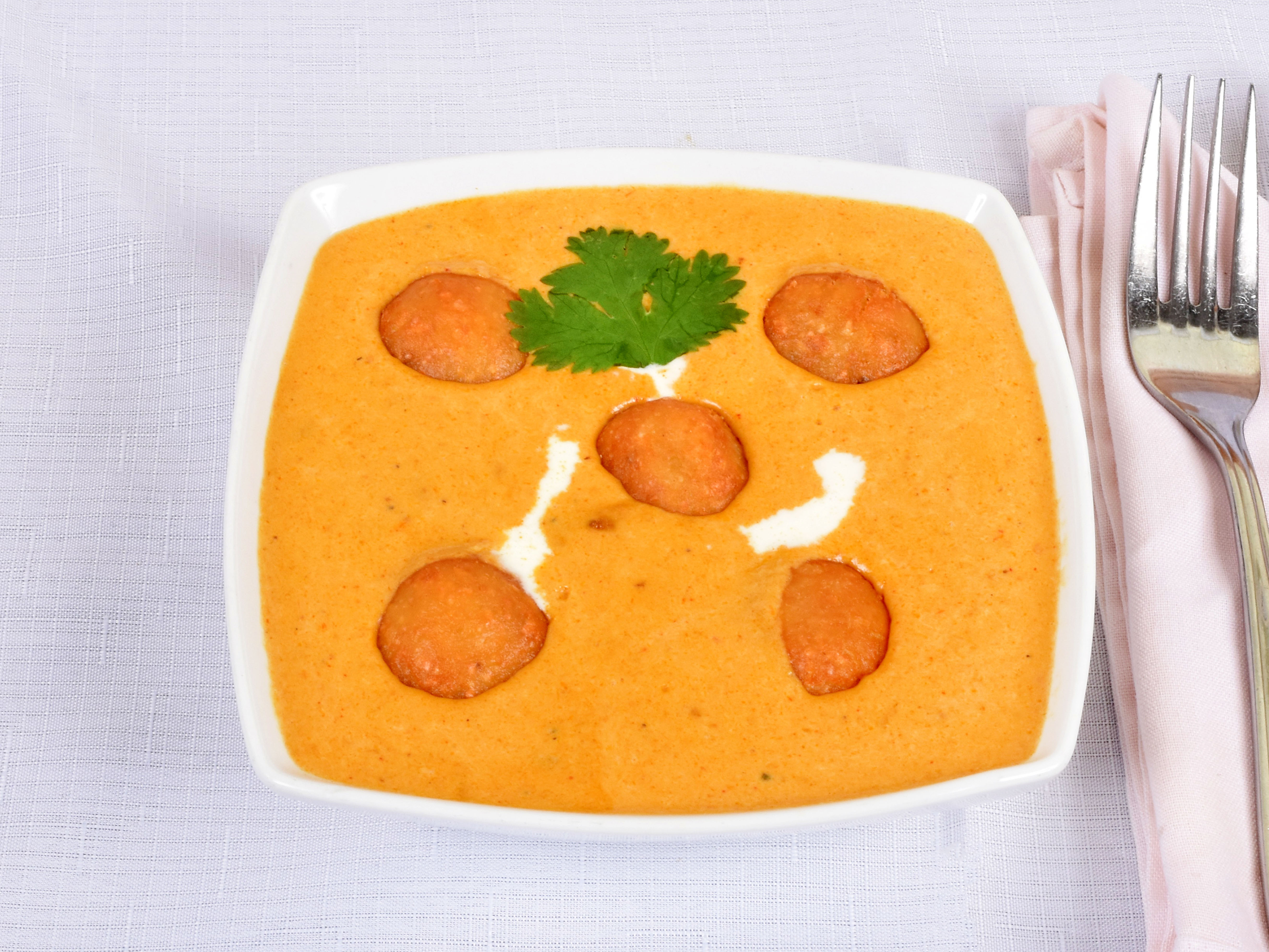 Order Malai Kofta food online from India Cafe store, White Plains on bringmethat.com