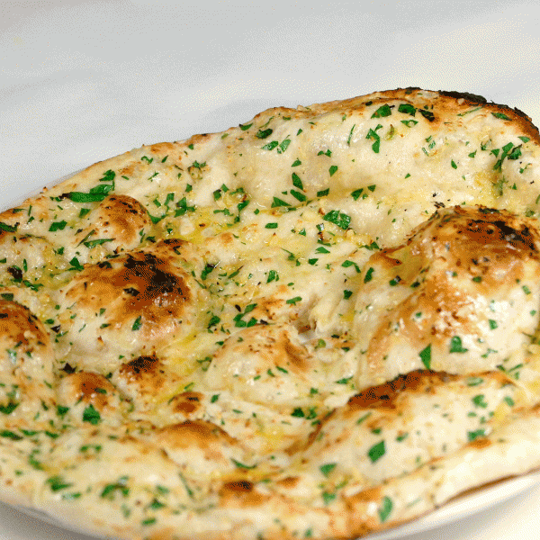 Order Garlic Naan food online from Chef of India store, Jersey City on bringmethat.com