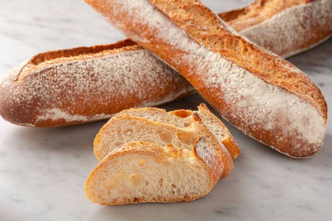 Order Sourdough Baguette food online from Porto's Bakery & Cafe store, Downey on bringmethat.com