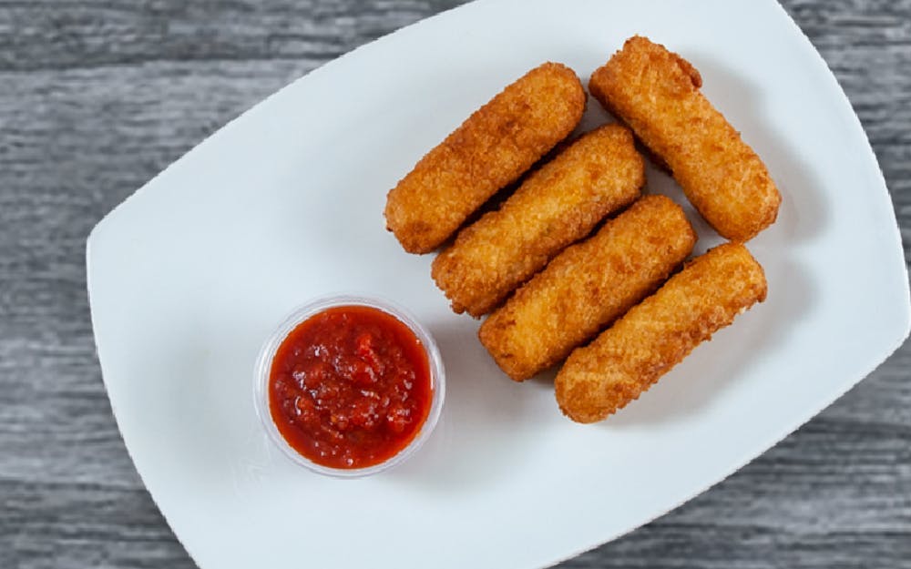 Order Fried Mozzarella Sticks - Appetizer food online from Seasons Pizza store, Wilmington on bringmethat.com