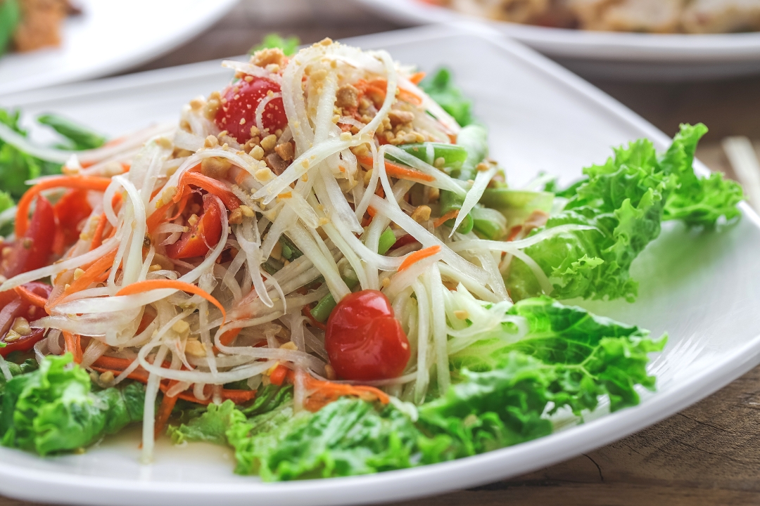 Order Green Papaya Salad food online from Family Thais Asian Bistro store, Dallas on bringmethat.com