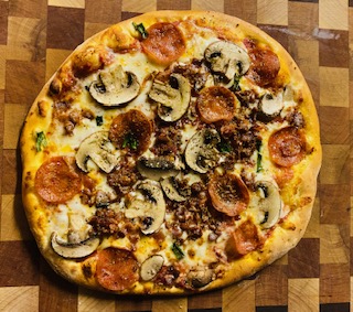 Order Grateful Dead Pizza food online from Woodstock Fire Foods store, Meridian on bringmethat.com