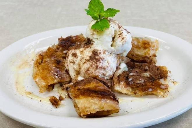 Order Banana Roti with Coconut Ice Cream food online from Thong's Authentic Thai Restaurant store, Green Bay on bringmethat.com