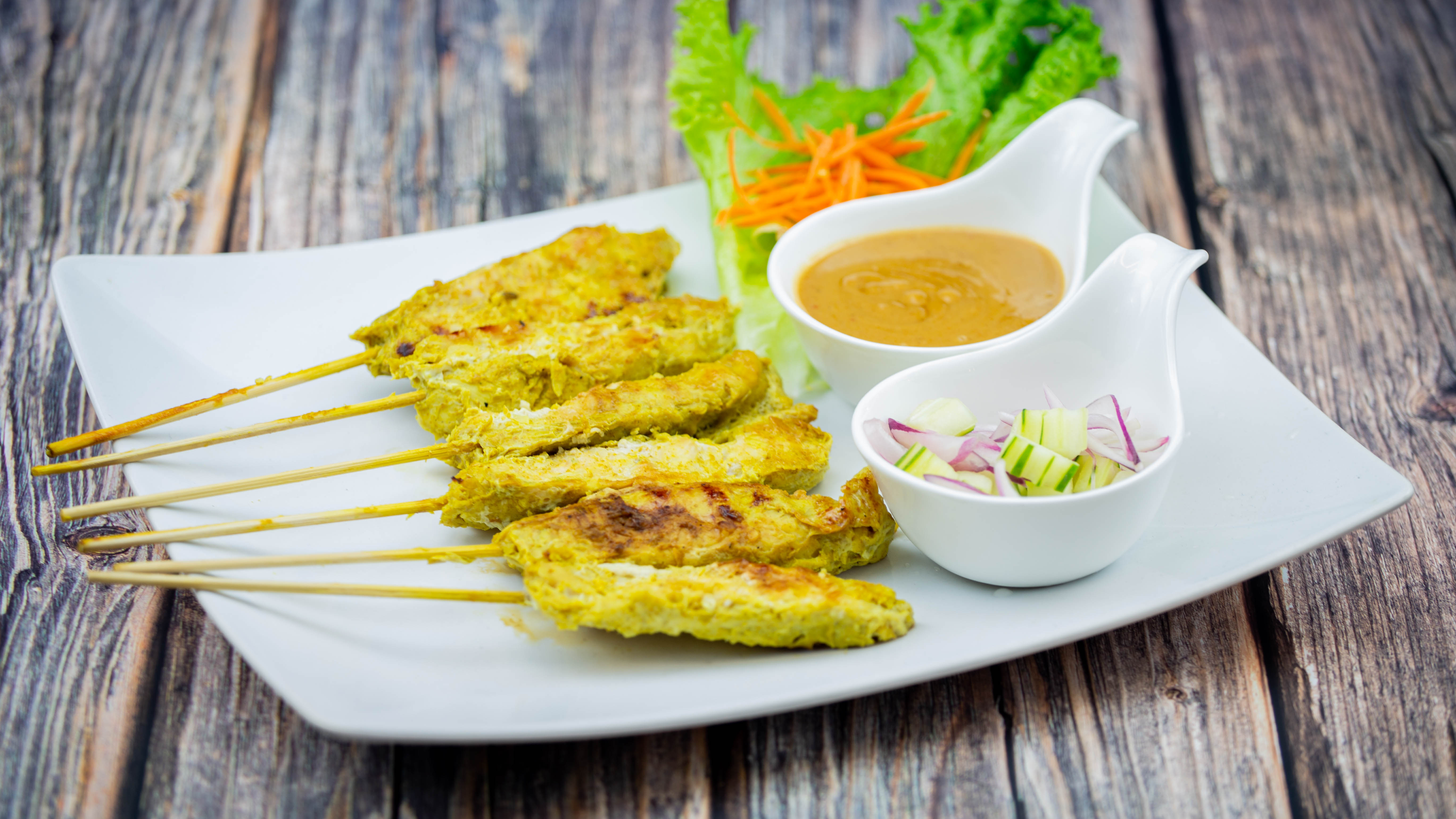 Order Chicken Satay (6 Pieces) food online from Phayathai Cuisine store, Seattle on bringmethat.com