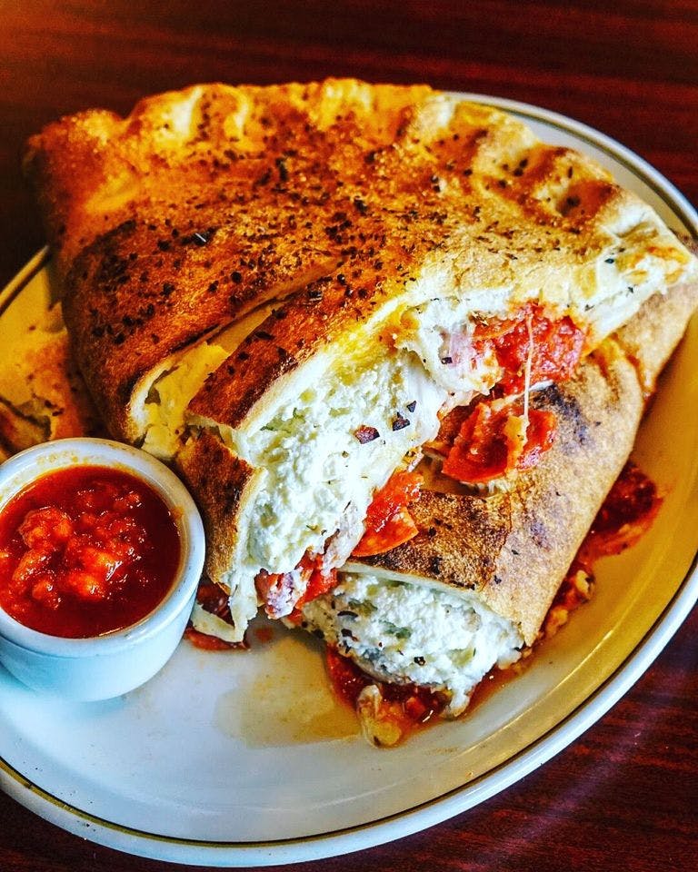 Order Super Calzone - Large food online from Mr G's Pizzeria & Wings store, Fairlawn on bringmethat.com