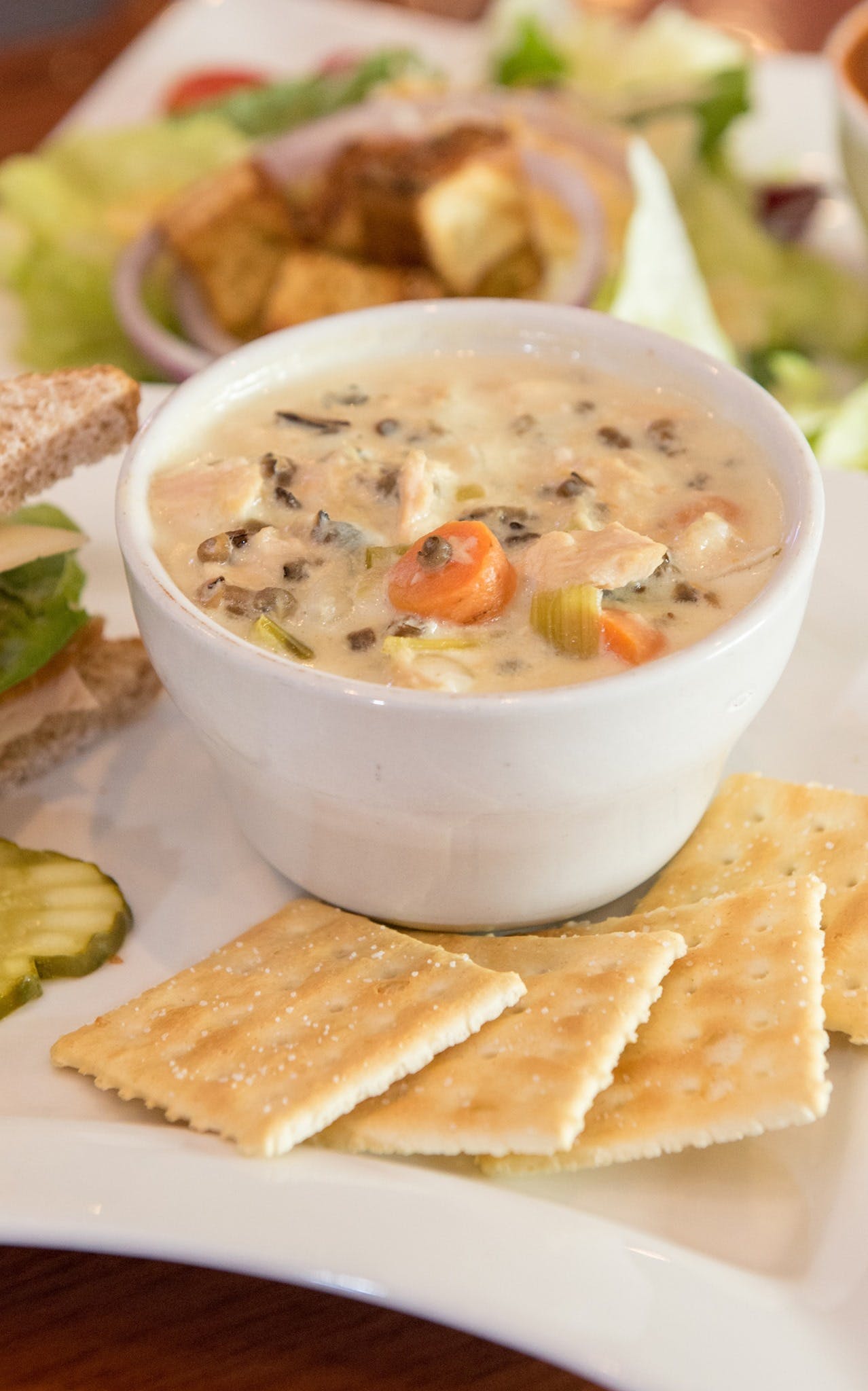 Order Creamy Chicken Wild Rice Soup - Cup food online from Fat Daddy Bar & Grill store, Alexandria on bringmethat.com