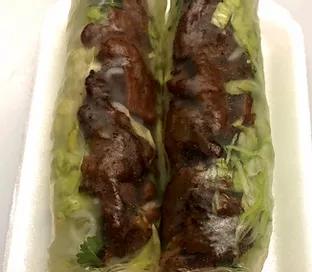 Order Grilled Beef Rolls  food online from Crispy Banh Mi store, Charlotte on bringmethat.com