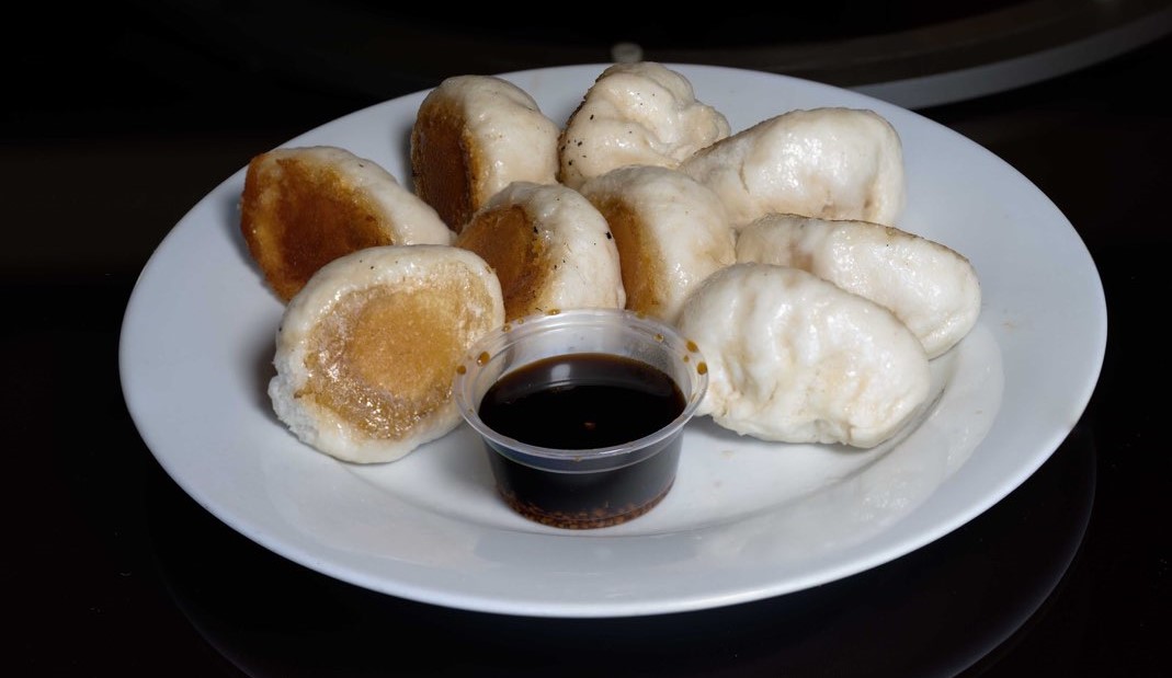 Order Pan Fried Steamed Pork Buns 猪肉水煎包 food online from China town Restaurant store, Anchorage on bringmethat.com