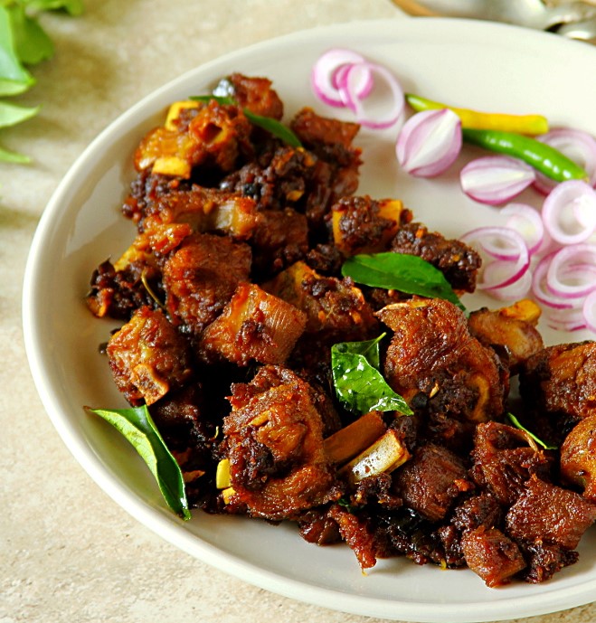 Order Chef's Special Mutton Sukha (Dry) food online from Ruchi Indian Restaurant store, Bellevue on bringmethat.com