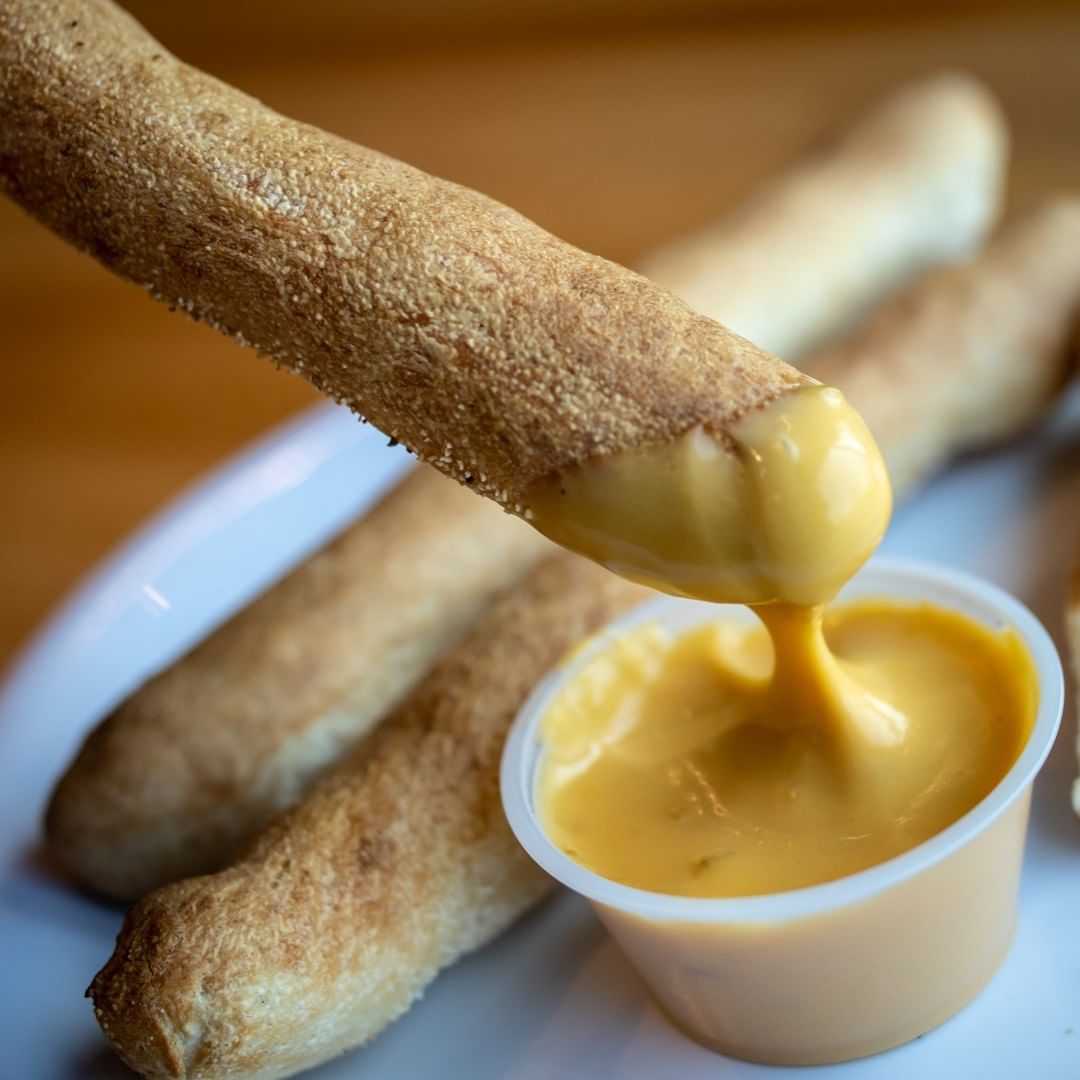 Order 6 Breadsticks and 2 Dip food online from Noble Roman Pizza store, Lehi on bringmethat.com