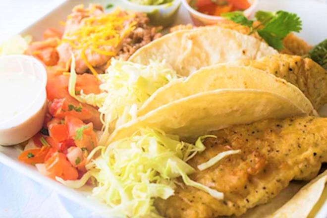 Order Fish Tacos (Two Pieces) Combination food online from Julioberto store, Phoenix on bringmethat.com