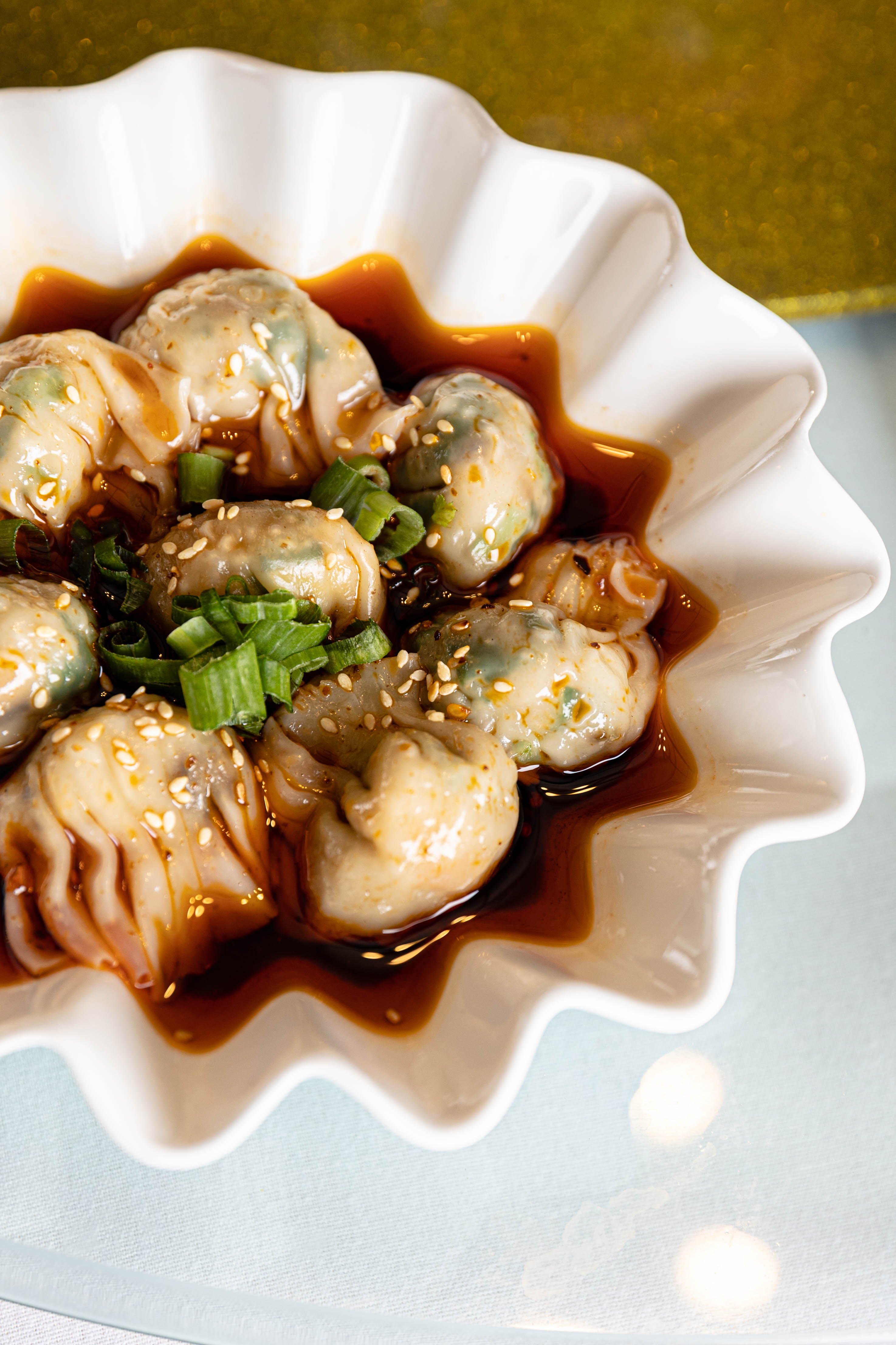 Order Dumplings in hot oil 红油抄手 food online from Sichuan hot pot cuisine store, New York on bringmethat.com