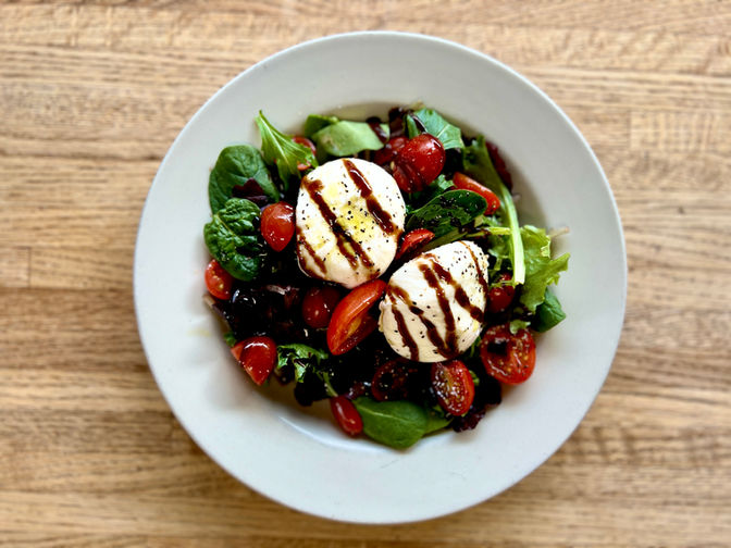 Order Tomato Burrata Salad food online from CELEBRITY DELLY store, Falls Church on bringmethat.com