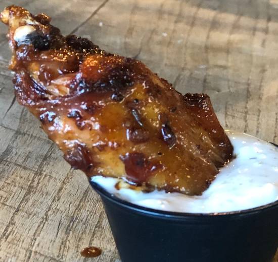 Order Smoked Chicken Wings - Bourbon Glaze food online from Holy Cow store, Alexandria on bringmethat.com