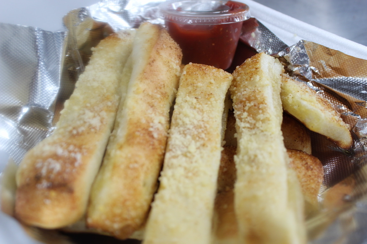 Order Breadsticks food online from Buffalo Pizza & Wings store, Macomb on bringmethat.com