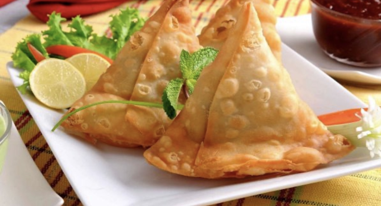 Order 2 Pieces Chicken Samosa food online from Desi grill store, Brooklyn on bringmethat.com