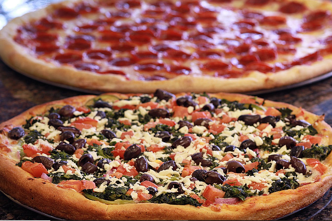 Order Greek Pizza - Medium food online from Arminio's Italian Corner store, Chatham Township on bringmethat.com