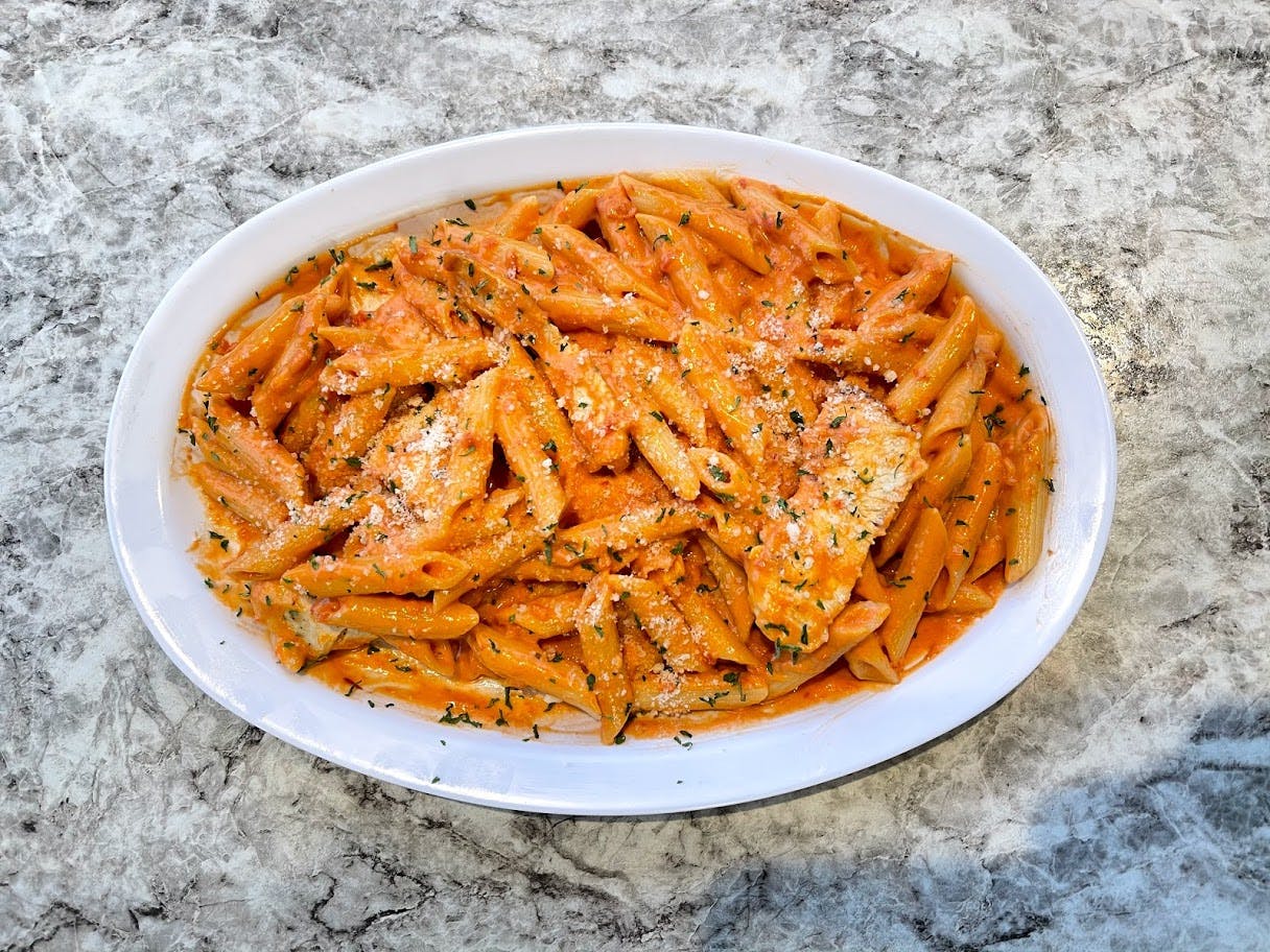 Order Pasta with Vodka Sauce - Pasta food online from Sonny Restaurant & Pizzeria store, Englewood on bringmethat.com