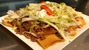 Order 120. Nachos Supremo food online from La Tolteca store, Williamsburg on bringmethat.com