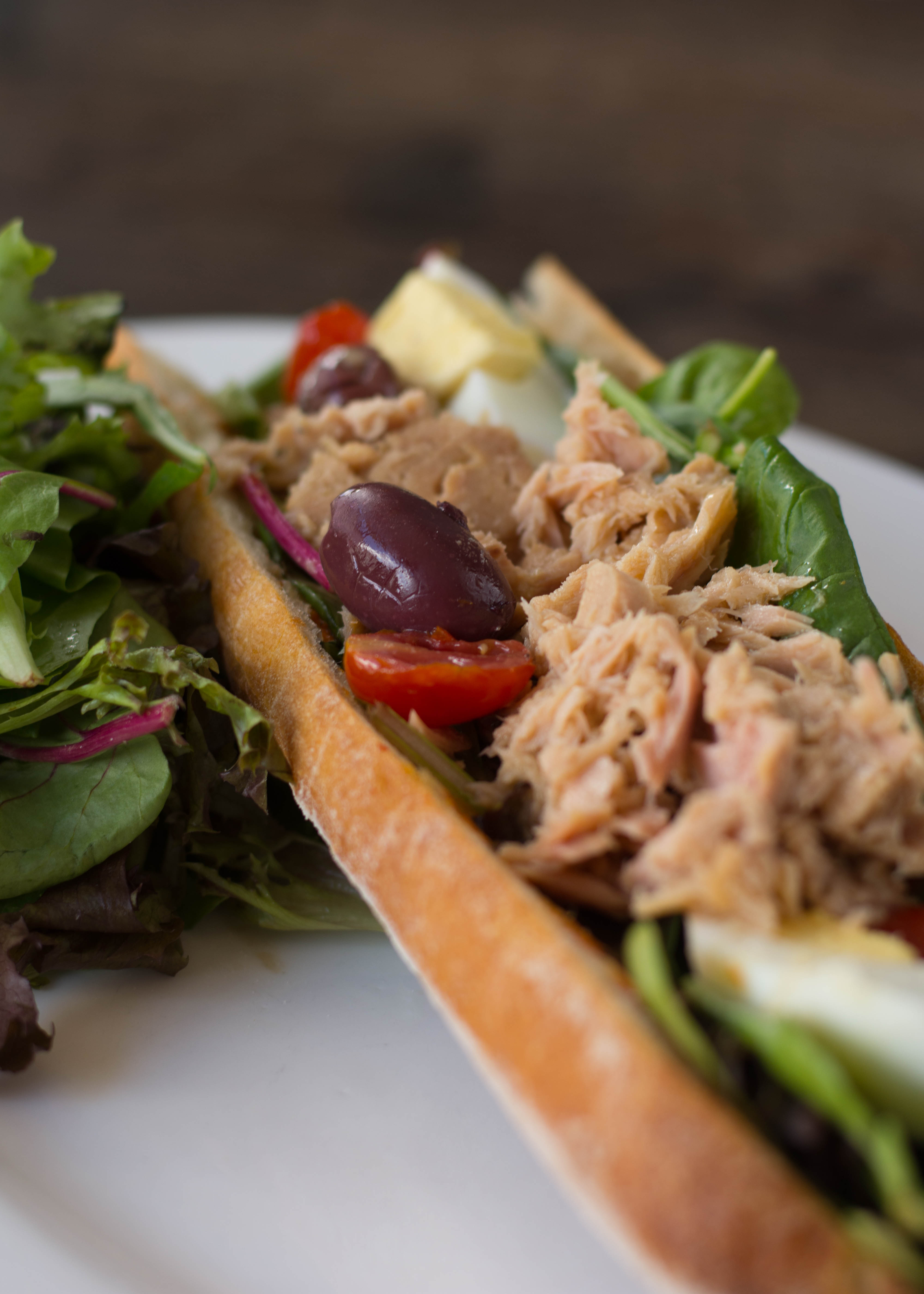 Order Mediterranean Tuna Sandwich food online from Roast n Co store, Forest Hills on bringmethat.com