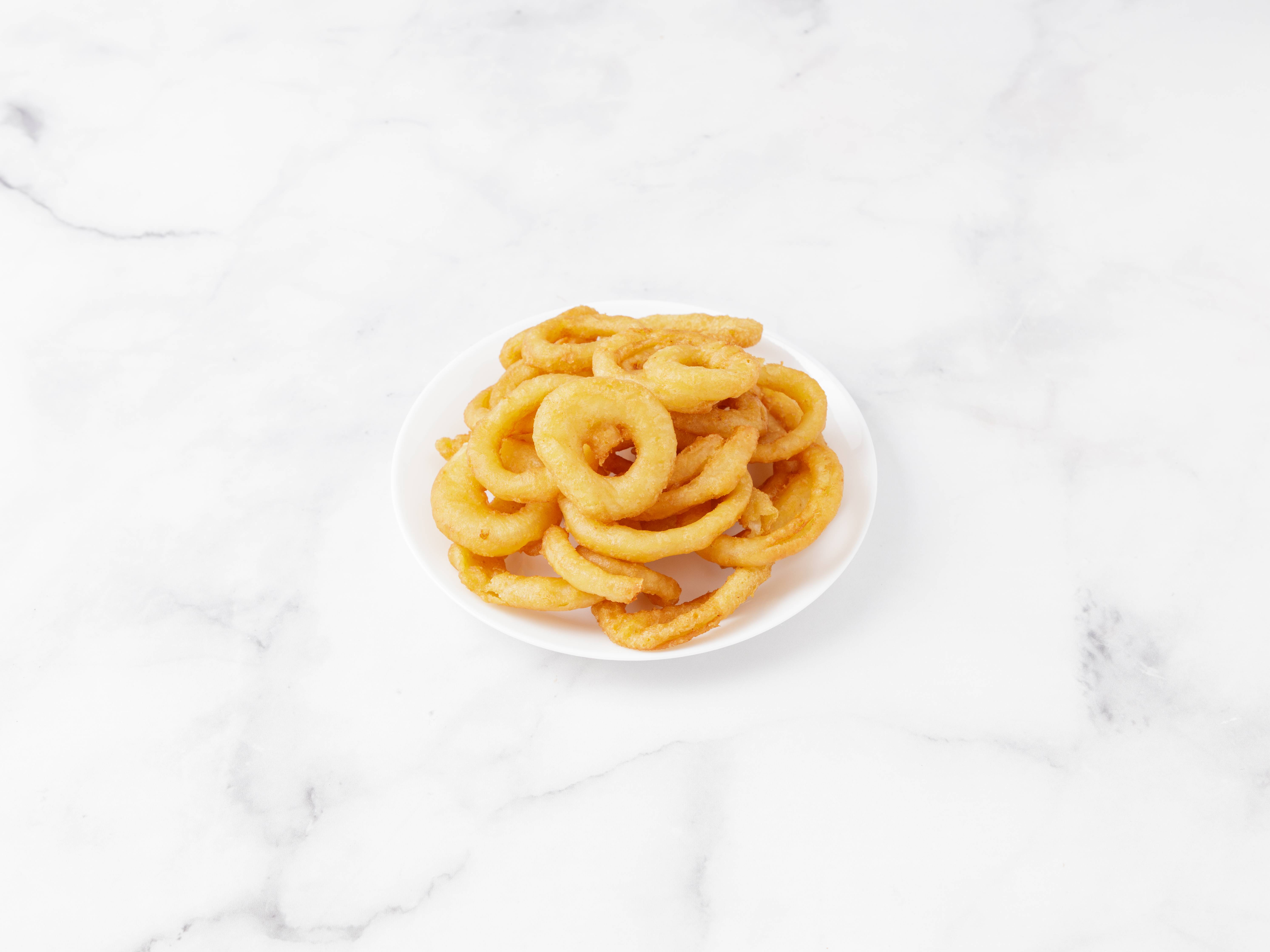 Order Onion Rings food online from More Than Pizza store, New Haven on bringmethat.com